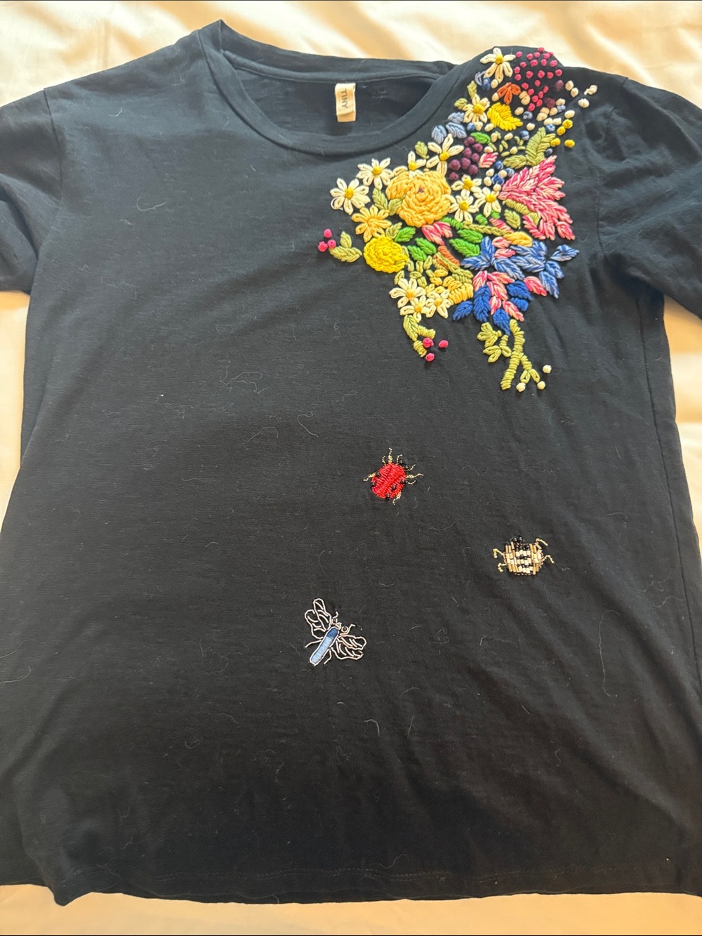 Black Short-Sleeve Tee with Colorful Embroidered Florals & Bugs